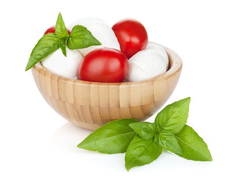simsearch:400-08071423,k - Mozzarella cheese with cherry tomatoes and basil. Isolated on white background Foto de stock - Royalty-Free Super Valor e Assinatura, Número: 400-07168673