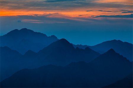 simsearch:400-07302061,k - Sunset over the Fagaras Mountains, Romania. View from Moldoveanu Peak  2544m. Foto de stock - Royalty-Free Super Valor e Assinatura, Número: 400-07168704