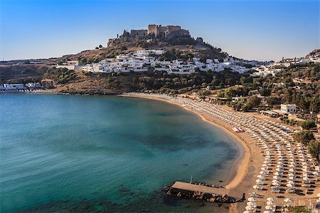 Lindos with the castle above on the Greek Island of Rhodes Stock Photo - Budget Royalty-Free & Subscription, Code: 400-07168706