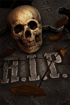 death fear - Creepy skull on gravestone in cemetary Stock Photo - Budget Royalty-Free & Subscription, Code: 400-07168709