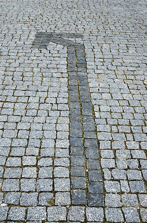 simsearch:400-08051905,k - cobbled road with arrow as background Stock Photo - Budget Royalty-Free & Subscription, Code: 400-07168765