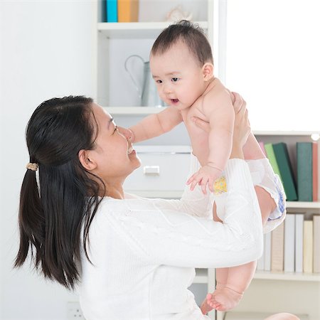simsearch:400-06077328,k - Asian mother and six months old baby girl at home. Foto de stock - Super Valor sin royalties y Suscripción, Código: 400-07168924
