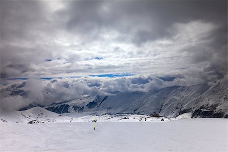 simsearch:400-08780271,k - Ski slope in bad weather. Caucasus Mountains. Georgia, ski resort Gudauri. Wide-angle view. Photographie de stock - Aubaine LD & Abonnement, Code: 400-07169011