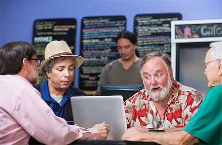 simsearch:400-07042113,k - Four serious mature men in cafe with laptop Stock Photo - Budget Royalty-Free & Subscription, Code: 400-07169037
