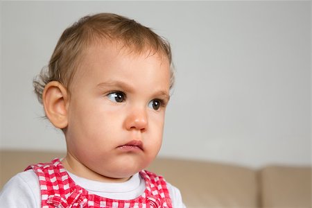 simsearch:400-04436228,k - Portrait of a sad or scaptical looking baby Stock Photo - Budget Royalty-Free & Subscription, Code: 400-07169077