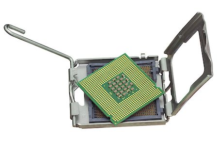 simsearch:400-03966982,k - The computer the processor on a white background is isolated gold color with a microcircuit Stock Photo - Budget Royalty-Free & Subscription, Code: 400-07169130
