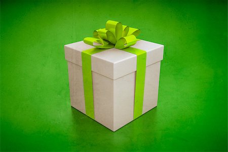 simsearch:694-03328113,k - An image of a nice gift box on a green background Fotografie stock - Microstock e Abbonamento, Codice: 400-07169229