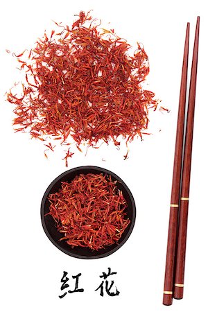 Safflower used in traditional chinese herbal medicine with mandarin title script translation and chopsticks. Hong hua. Carthemus tinctorius flos. Stock Photo - Budget Royalty-Free & Subscription, Code: 400-07169281