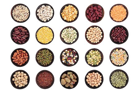 Large dried pulses selection in wooden bowls over white background. Photographie de stock - Aubaine LD & Abonnement, Code: 400-07169414