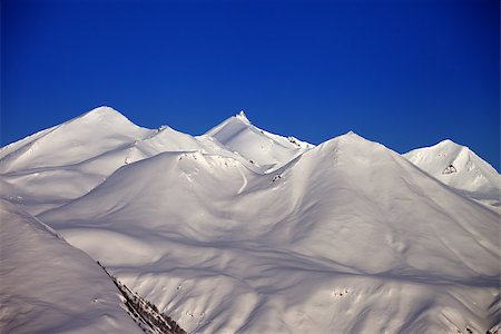 simsearch:400-04308471,k - Snowy mountains in morning. Caucasus Mountains, Georgia, ski resort Gudauri. Stock Photo - Budget Royalty-Free & Subscription, Code: 400-07169960