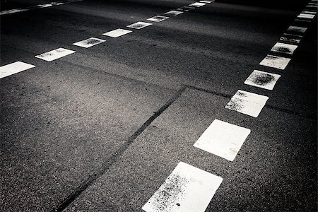 Close up of pedestrian crossing on asphalt Photographie de stock - Aubaine LD & Abonnement, Code: 400-07174247