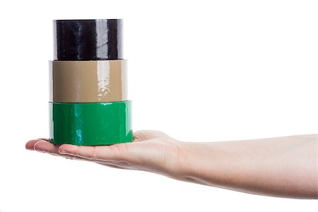 Hand holding tower made of adhesive tape isolated on white Foto de stock - Super Valor sin royalties y Suscripción, Código: 400-07174260