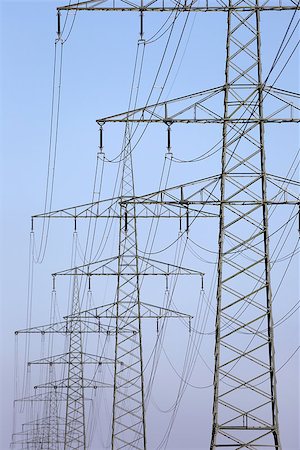 simsearch:853-05523649,k - Electricity pylons and lines in a row during sunset, power and energy topic Stock Photo - Budget Royalty-Free & Subscription, Code: 400-07174320