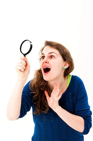 simsearch:400-04554899,k - woman face think an look up and with magnifying glass on a white background Stock Photo - Budget Royalty-Free & Subscription, Code: 400-07174629