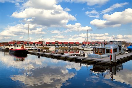 simsearch:400-07680821,k - harbor at Reitdiephaven with sky reflected in water, Groningen Foto de stock - Royalty-Free Super Valor e Assinatura, Número: 400-07174933