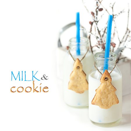 Sweet cookies and milk on a white background. Foto de stock - Super Valor sin royalties y Suscripción, Código: 400-07175459
