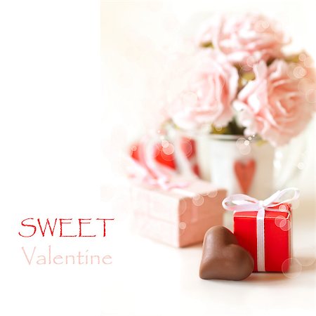 simsearch:400-07957212,k - Sweet heart chocolate and roses on a white background. Stock Photo - Budget Royalty-Free & Subscription, Code: 400-07175469