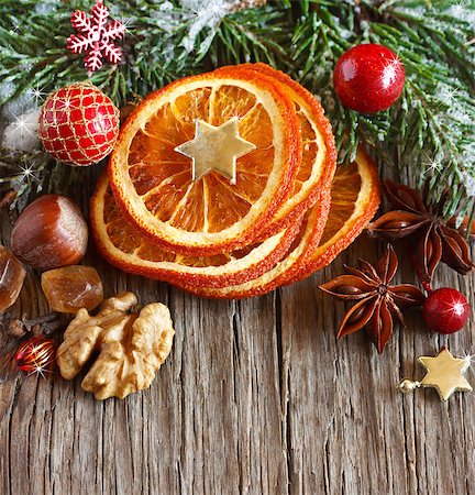 Christmas decoration with dried orange slices, nuts and spices. Stock Photo - Budget Royalty-Free & Subscription, Code: 400-07175473