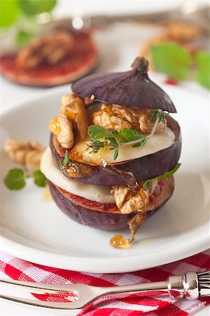 Delicious fig, cheese and walnut with honey. Stock Photo - Budget Royalty-Free & Subscription, Code: 400-07175485