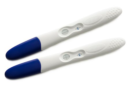 Two pregnancy tests- positive and negative. Isolated on a white background. Photographie de stock - Aubaine LD & Abonnement, Code: 400-07175881