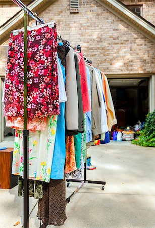 Image of clothes on hangers at a garage sale Stock Photo - Budget Royalty-Free & Subscription, Code: 400-07176145