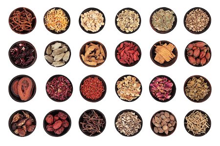 simsearch:400-08618279,k - Traditional chinese herbal medicine in wooden bowls isolated over white background. Foto de stock - Super Valor sin royalties y Suscripción, Código: 400-07176437