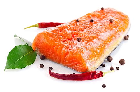 relish - fresh salmon fillet with salt and spice isolated on white background Photographie de stock - Aubaine LD & Abonnement, Code: 400-07178951