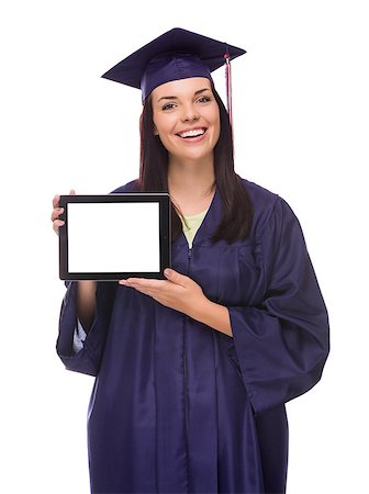 simsearch:400-04125503,k - Happy Mixed Race Female Graduate in Cap and Gown Holding Blank Computer Tablet Isolated on White. Photographie de stock - Aubaine LD & Abonnement, Code: 400-07179054