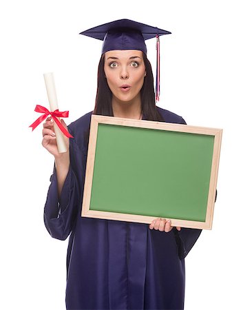 simsearch:400-04125503,k - Happy Graduating Mixed Race Female Wearing Cap and Gown Holding a Blank Chalkboard and Diploma Isolated on a White Background. Photographie de stock - Aubaine LD & Abonnement, Code: 400-07179052