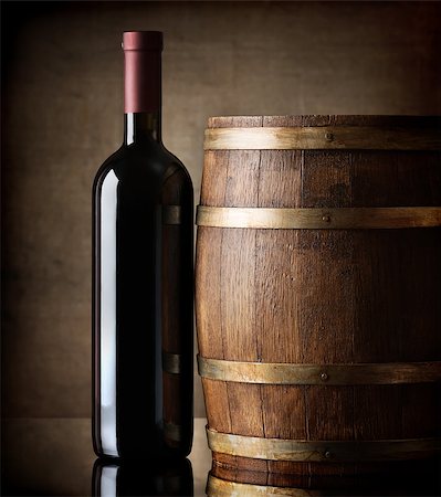 Bottle of red wine and a wooden barrel Stock Photo - Budget Royalty-Free & Subscription, Code: 400-07179135