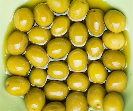 Green olives in olive oil Stock Photo - Budget Royalty-Free & Subscription, Code: 400-07179373