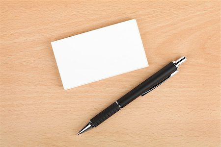 simsearch:400-06462302,k - Blank business cards and pen on wooden office table Stock Photo - Budget Royalty-Free & Subscription, Code: 400-07179498