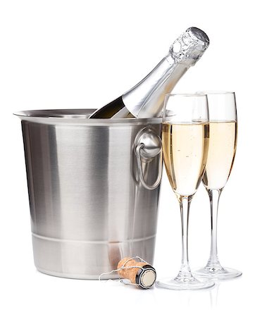 Champagne bottle in bucket and two glasses. Isolated on white background Stock Photo - Budget Royalty-Free & Subscription, Code: 400-07179529