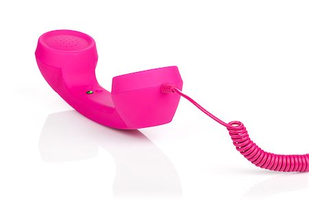 simsearch:400-07038627,k - Pink vintage telephone. Isolated on white background Fotografie stock - Microstock e Abbonamento, Codice: 400-07179626