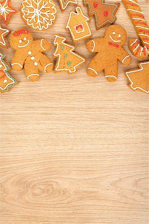 Homemade various christmas gingerbread cookies on wooden background with copy space Stock Photo - Budget Royalty-Free & Subscription, Code: 400-07179637