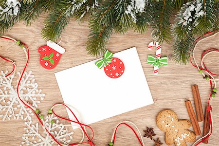 simsearch:400-07299371,k - Christmas fir tree, gingerbread cookies and card for copy space on wooden table Foto de stock - Super Valor sin royalties y Suscripción, Código: 400-07179631