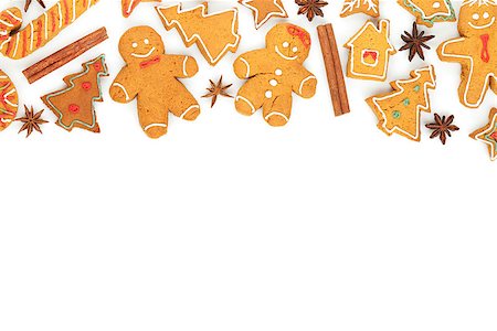 simsearch:400-07175496,k - Homemade various christmas gingerbread cookies on white background Fotografie stock - Microstock e Abbonamento, Codice: 400-07179650