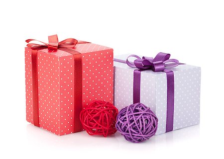 simsearch:400-07450793,k - Colorful gift boxes with ribbon and bow and christmas decor. Isolated on white background Stock Photo - Budget Royalty-Free & Subscription, Code: 400-07179700