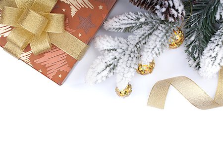 simsearch:400-07450793,k - Gift box and christmas decor under snowy fir tree. Isolated on white background Stock Photo - Budget Royalty-Free & Subscription, Code: 400-07179710