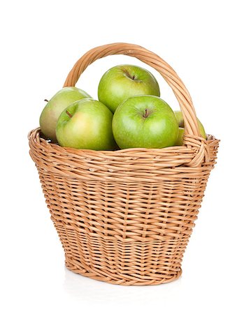 simsearch:400-07210105,k - Fresh ripe green apples in basket. Isolated on white background Foto de stock - Royalty-Free Super Valor e Assinatura, Número: 400-07179741
