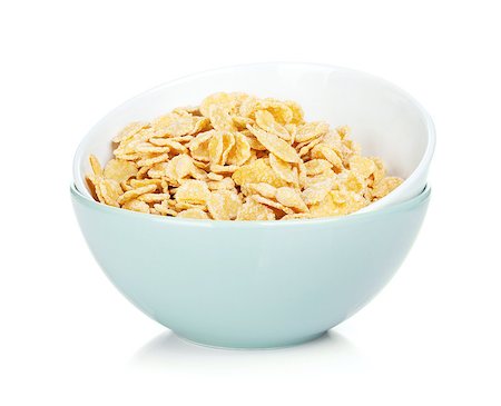 simsearch:400-05343907,k - Fresh corn flakes in bowl. Isolated on white background Foto de stock - Super Valor sin royalties y Suscripción, Código: 400-07179759