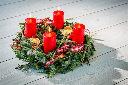 pine wreath on white - Advent wreath of twigs with four burning red candles and various ornaments Stock Photo - Budget Royalty-Free & Subscription, Code: 400-07179817