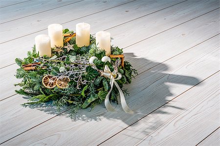 pine wreath on white - Advent wreath of twigs with white candles and various ornaments Stock Photo - Budget Royalty-Free & Subscription, Code: 400-07179820