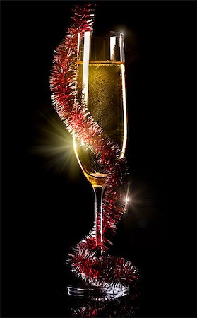 Champagne in glass on a black background Stock Photo - Budget Royalty-Free & Subscription, Code: 400-07179984
