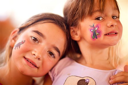 Cute Little Girls Showing Their Face Painting At A Party. Stock Photo - Budget Royalty-Free & Subscription, Code: 400-07170170