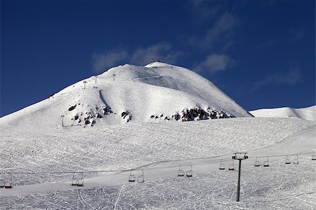 simsearch:400-08780271,k - Ski resort at nice winter day. Caucasus Mountains. Georgia, Gudauri. Mt. Sadzele. Photographie de stock - Aubaine LD & Abonnement, Code: 400-07170193