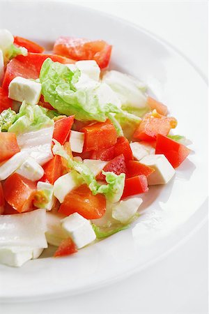 feta bowl - fresh vegetable salad with feta cheese and tomatoes Stock Photo - Budget Royalty-Free & Subscription, Code: 400-07170306