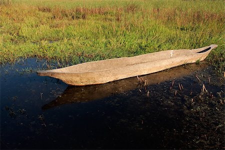 simsearch:400-04473063,k - Traditional wooden makoro boat in shallow water, Caprivi region, Namibia Foto de stock - Super Valor sin royalties y Suscripción, Código: 400-07170344