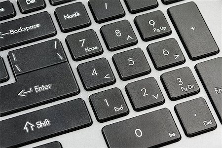 simsearch:400-08109808,k - Closeup of computer keyboard - black number keys on notebook laptop Fotografie stock - Microstock e Abbonamento, Codice: 400-07170541