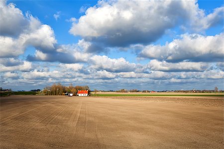 simsearch:400-07046539,k - beautiful sky over dutch farmhouse and big plowed field Stock Photo - Budget Royalty-Free & Subscription, Code: 400-07170892